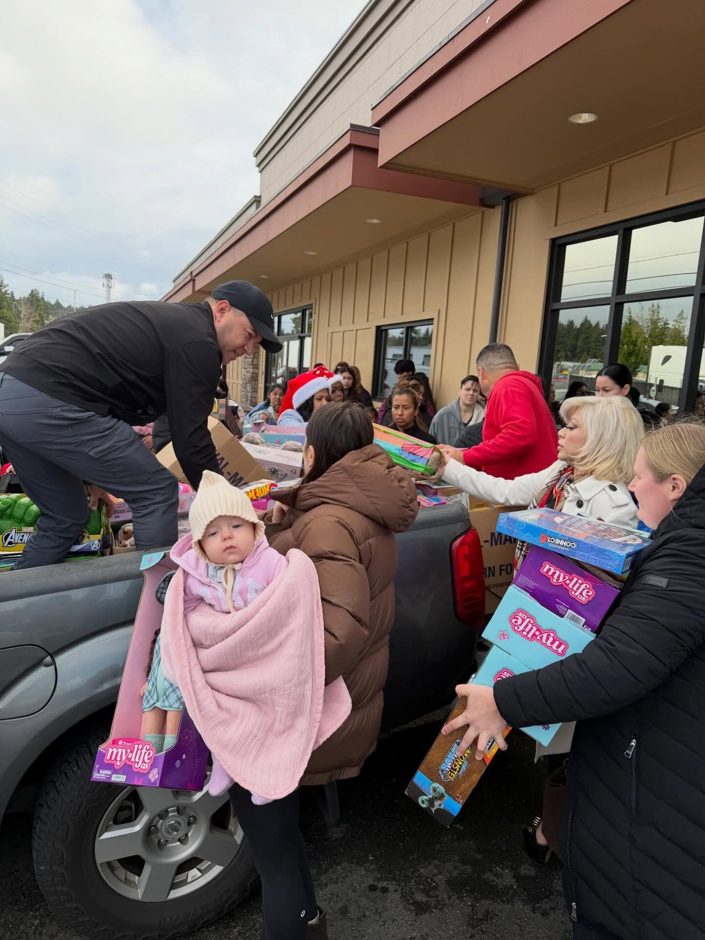 Handing out toys from a truck